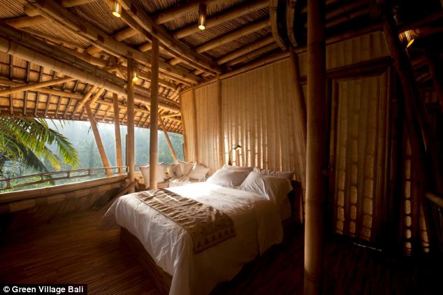 Specially designed roofs and roll down bamboo blinds shield the inside from the rainstorms in the jungle